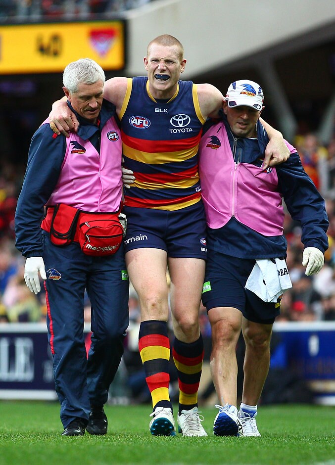 AFL 2016 Rd 19 - Adelaide v Essendon ADELAIDE, AUSTRALIA - JULY 31: Sam Jacobs of the Crows leaves the field injured during the round 19 AFL match between the Adelaide Crows and the Essendon Bombers at Adelaide Oval on July 31, 2016 in Adelaide, Australia. (Photo by Scott Barbour/AFL Media/Getty Images)
